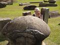 Christy peeks over the stones